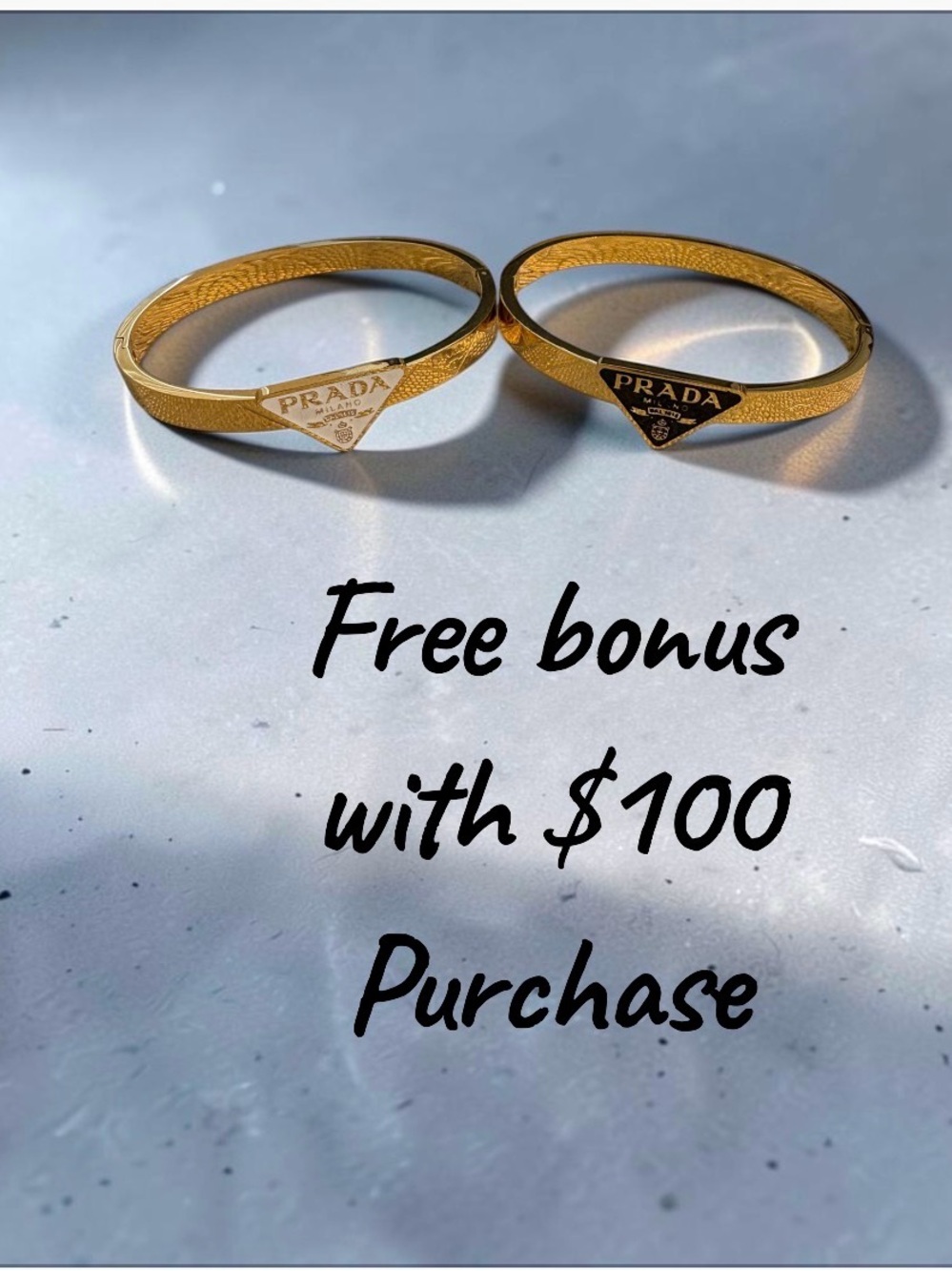 Gold-Tone Logo Bangle choice of Color.